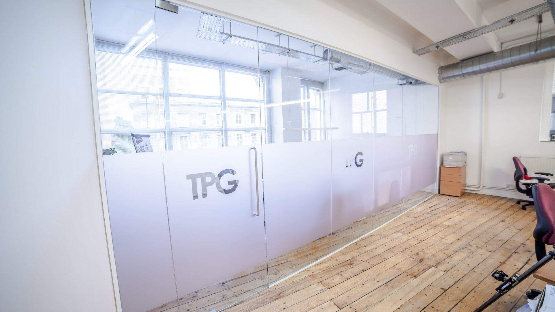 TPG office glass wall TPG office glass wall