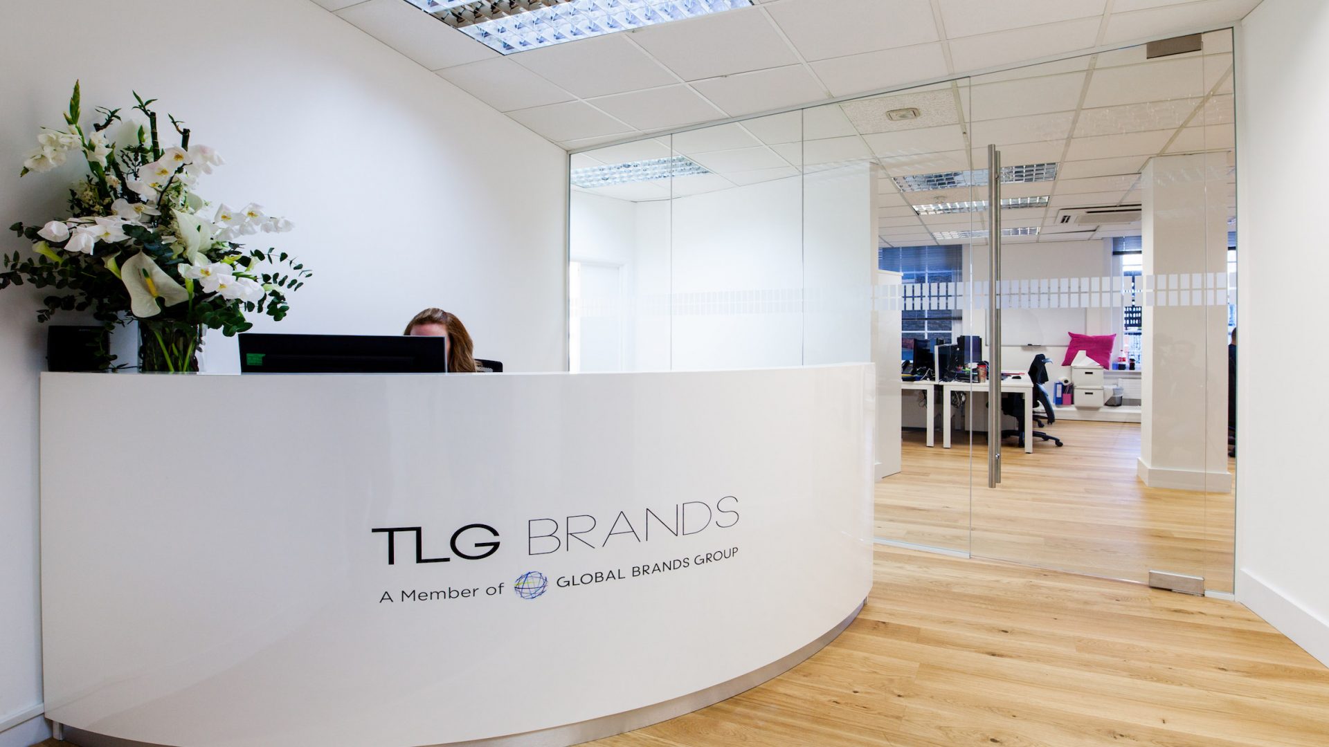 TLG Brands glass wall in the office TLG Brands glass wall in the office
