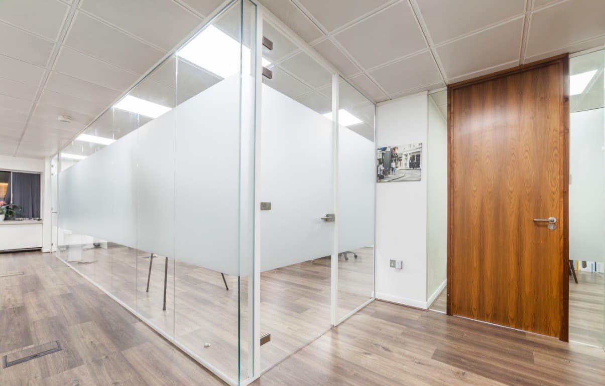 Glazed glass partition in an office